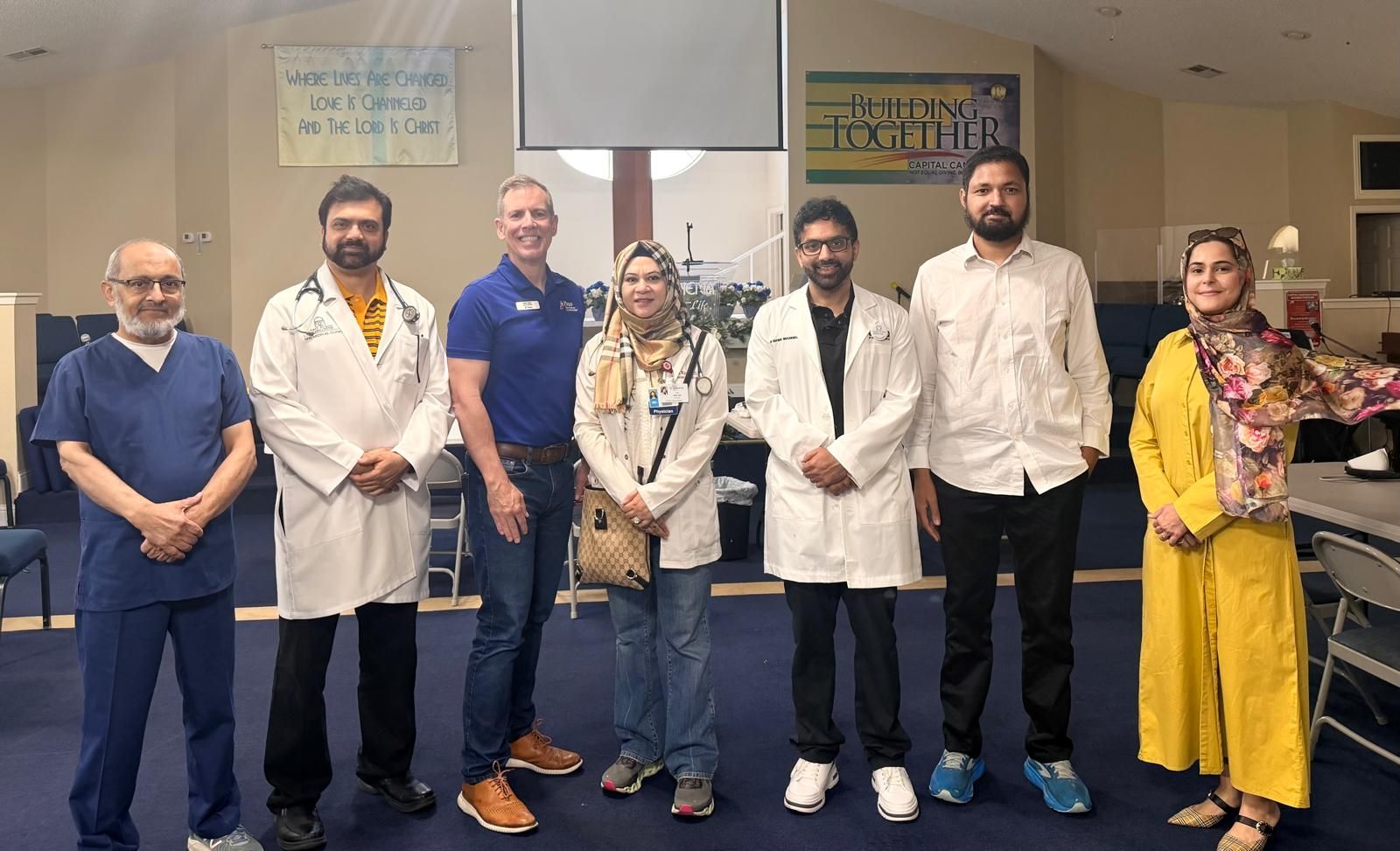 Dr. Rizvi with Plano City Council Member Bob Kehr and the volunteer physicians and organizers at the September 19, 2026 free health fair at The Rhema Life Fellowship Church in Plano