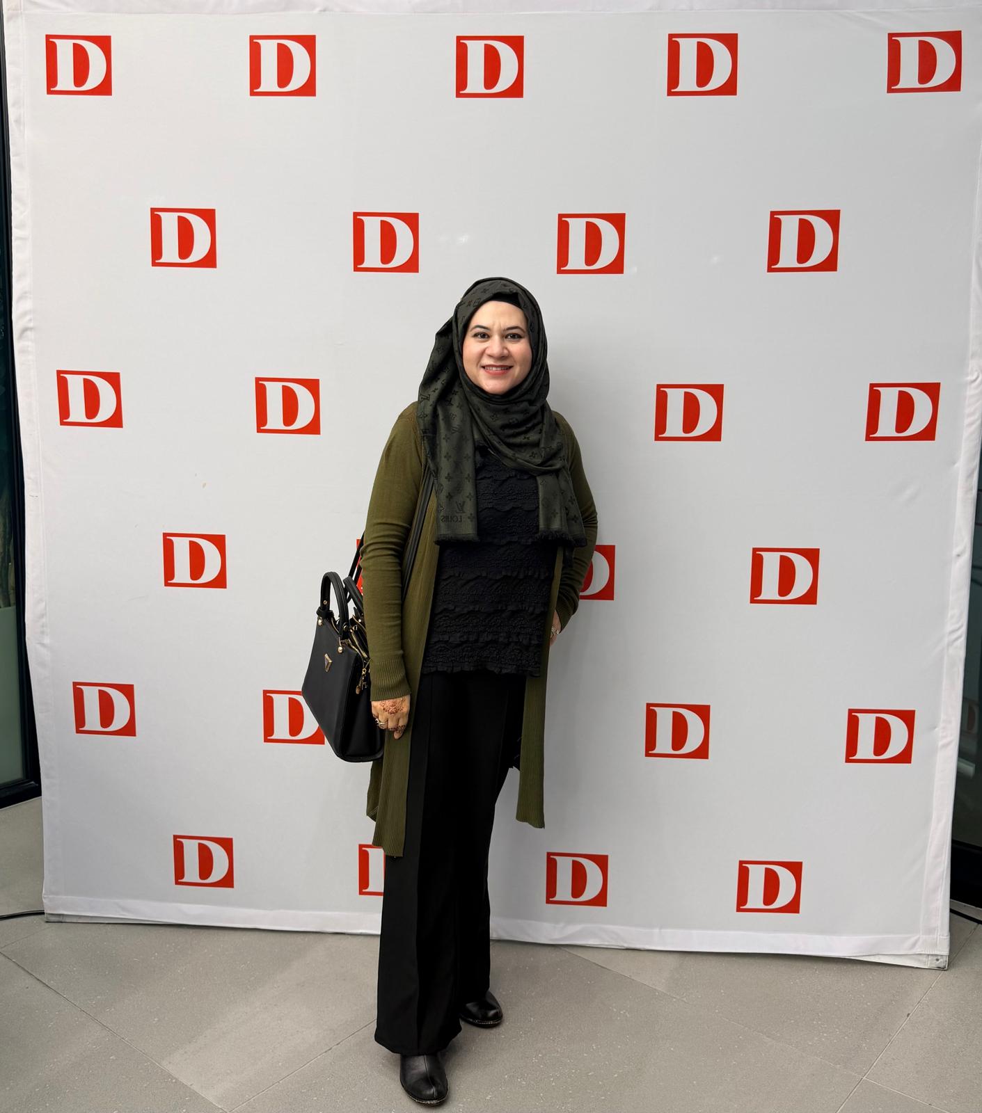 Dr. Rizvi at the D Magazine step-and-repeat backdrop