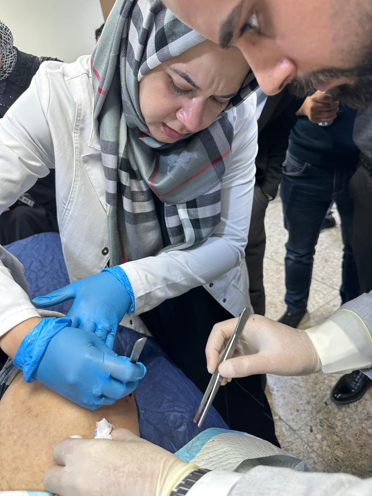 Dr. Rizvi treating patients during a volunteer medical mission