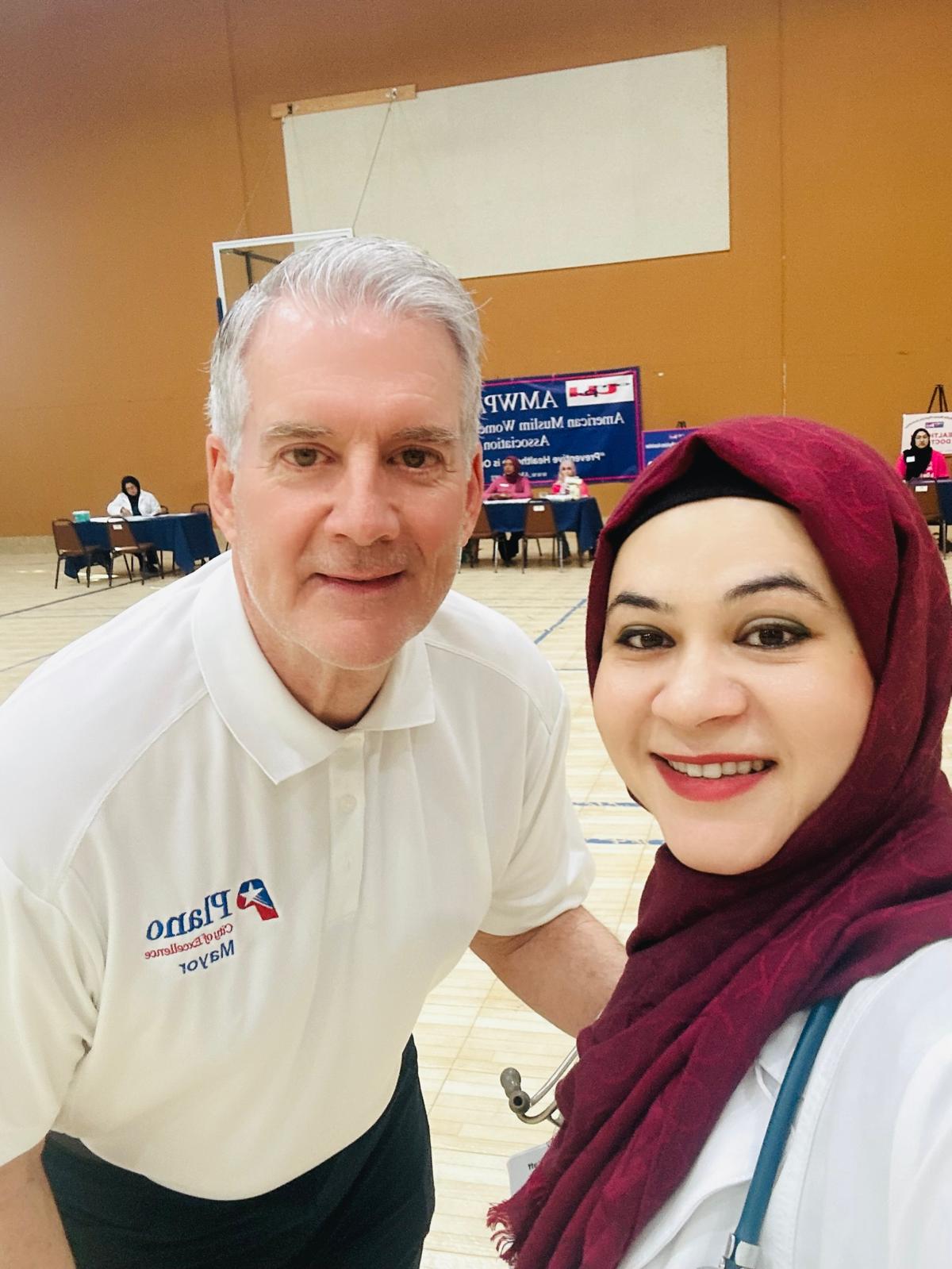 Dr. Rizvi with Mayor John B. Muns of Plano at the October 11, 2025 community health fair