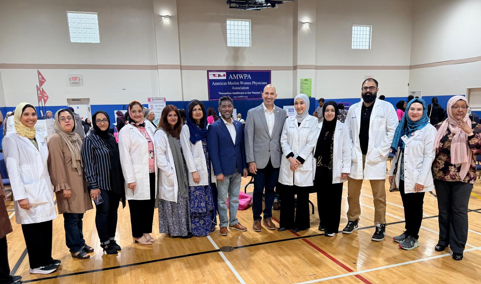 Dr. Rizvi with the physician and volunteer team at the April 4, 2026 Richardson Health & Wellness Fair