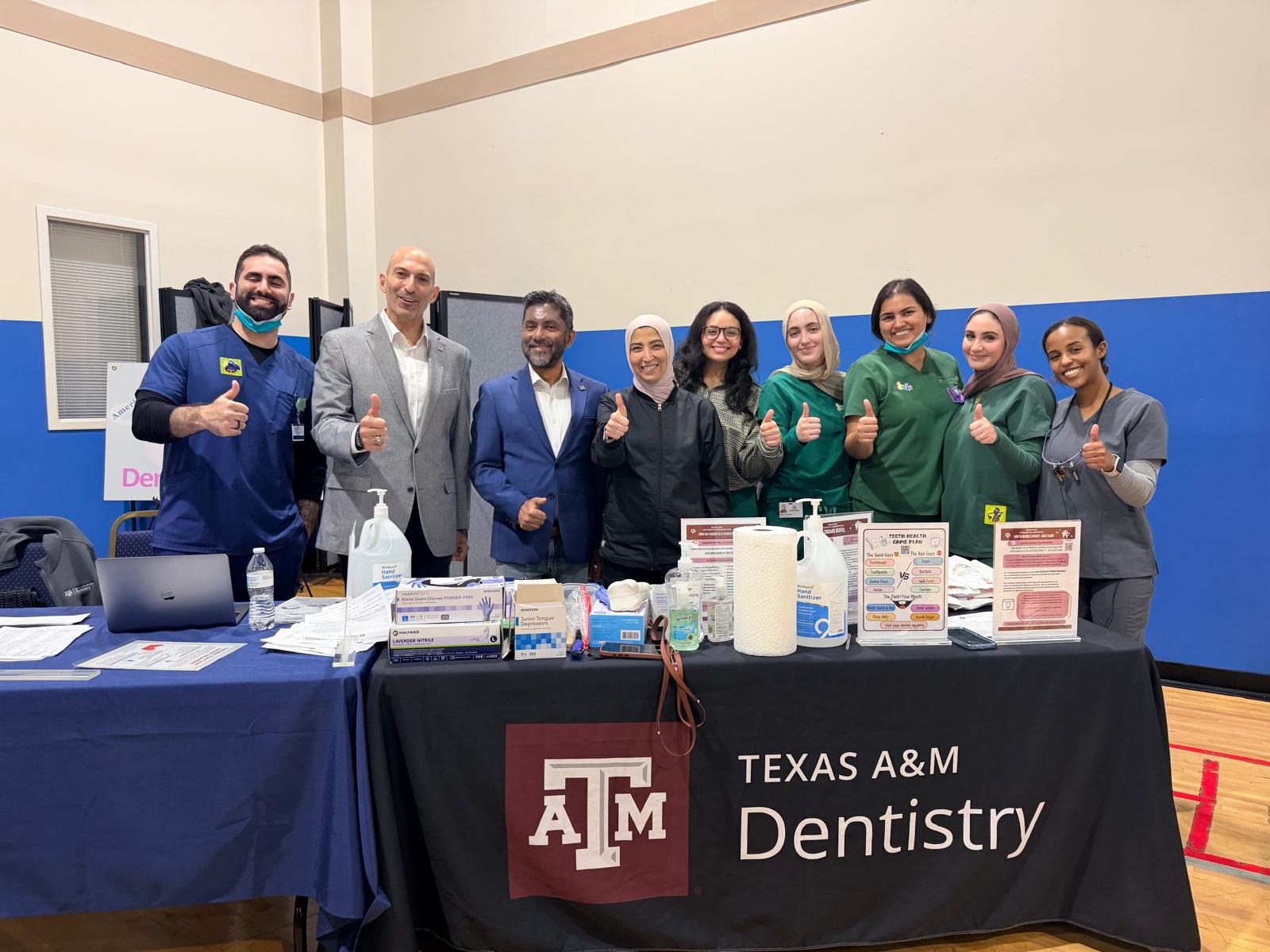Dr. Rizvi and the volunteer team at the Texas A&M College of Dentistry booth during the April 4, 2026 Richardson Health & Wellness Fair